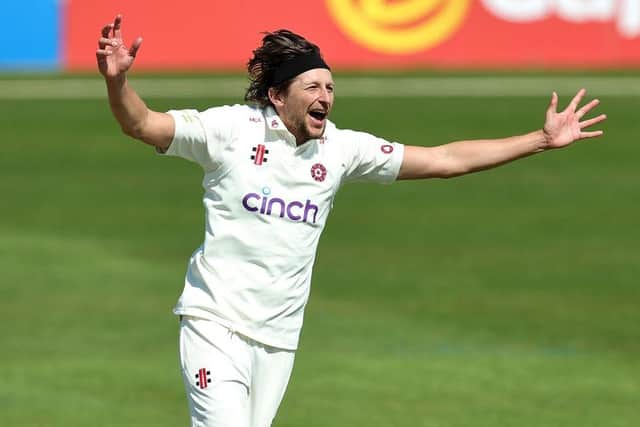 Jack White celebrates claiming the early wicket of Hampshire opener Fletcha Middleton