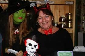 Stacey Pfadenhauer and her mother, Carol Mansell, pictured at a Halloween party in 2011.