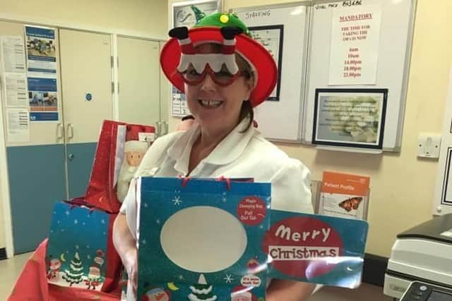 Items donated to the charity are given out to patients by ward staff on Christmas day