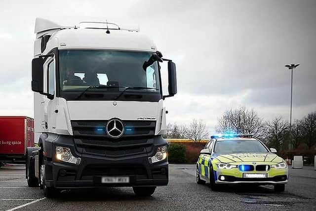 Police use the unmarked National Highways HGV 'supercab' to spot illegal and inconsiderate drivers on the M1 near Northampton