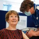 Margaret Keenan, 91, who was first to get a Covid jab in the UK, received her spring booster shot in Coventry last month