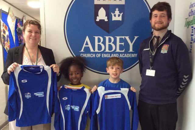 Abbey pupils with the new kit