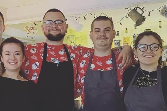 Luke (middle left) with his wife Ellie (left), chef and right hand man Frankie (middle right), and Frankie's partner Georgia (right).