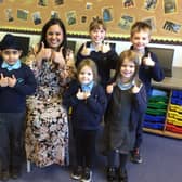 Barby Church of England Primary School pupils give the thumbs-up after a successful Ofsted visit.