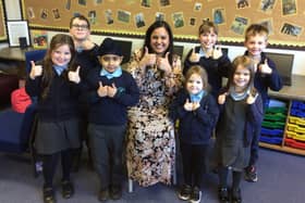 Barby Church of England Primary School pupils give the thumbs-up after a successful Ofsted visit.