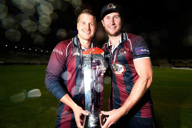 Josh Cobb and skipper Alex Wakely with the Blast Trophy following the Steelbacks' win in 2016