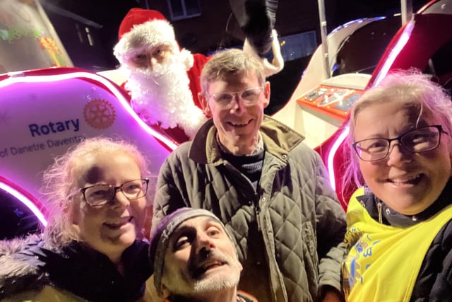 Santa pictured with Sue Hobson, a collector and rotarian, Drew Winslow, collector and rotarian, Simon Shepherd, driver, and Leaona Last, a night leader and rotarian.