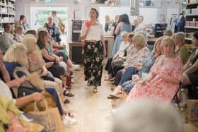 Guests pack out Sheaf Street Health Store for the fashion show.