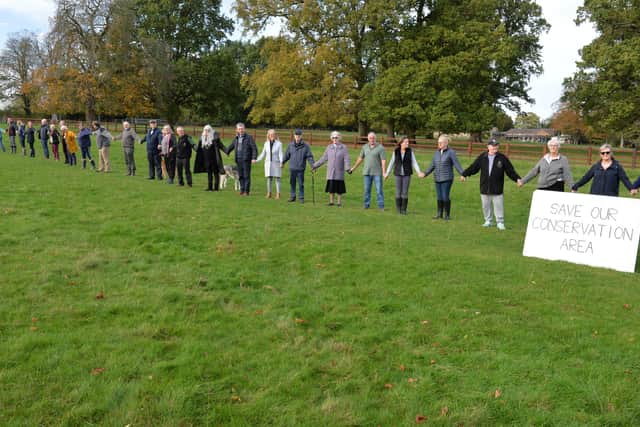 Protesters in Bugbrooke link hands in conservation area in protest