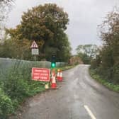 From October 2017 until the present, WNC has installed temporary traffic lights over the rail line bridge in Bugbrooke Road for a total cost of £222,668.31.