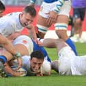 Alex Mitchell scored a crucial try for England (photo by ANDREAS SOLARO/AFP via Getty Images)