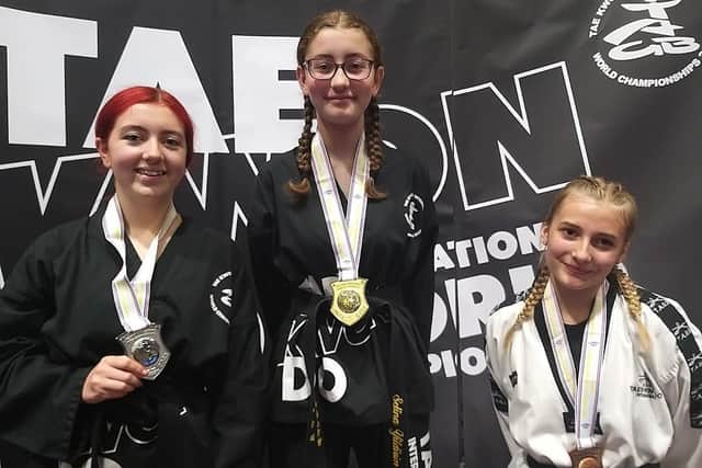 Selina Yildirim winning an individual gold medal in the girls’ black belt youth division.