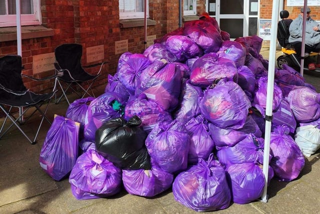 The groups collected 203 bags of clothing and accessories, worth around £5000, for Cancer Research UK.