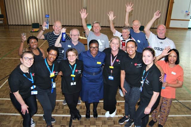Recovering patients give the NGH Cardiac Rehab team a cheer for the support they provide.