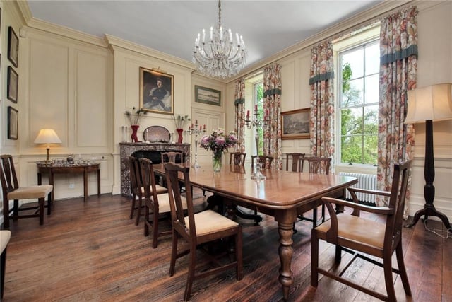 This historic home has traditional features throughout and rolling countryside views.