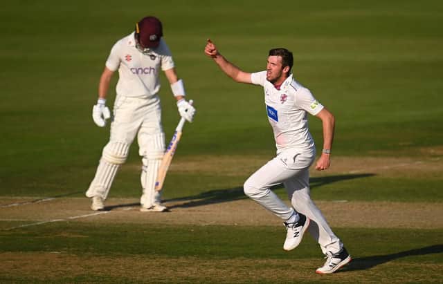 Somerset's Craig Overton celebrates the crucial wicket of Northants skipper Will Young