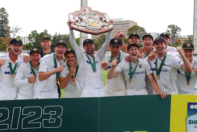 Sam Whiteman (centre) leads the Western Australia celebrations after their Sheffield Shield success in March