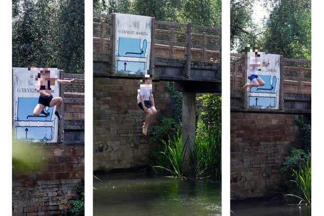 Youngsters 'tombstoning' off Nine Arches Bridge that crosses the River Nene at Thrapston