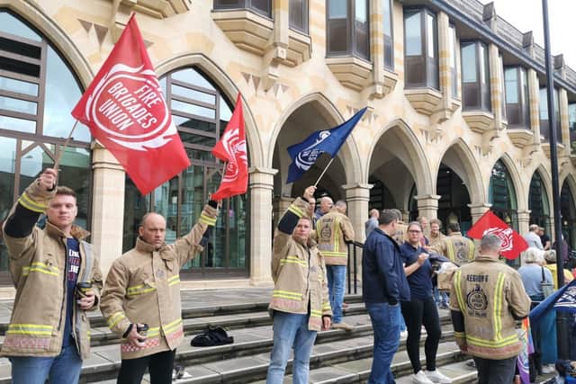 Firefighters protesting outside The Guildhall in Northampton earlier this year.