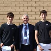 Mr Frazer pictured with Harry Railton (left) and Arthur Tilt (right). Both achieved top results.