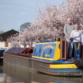 Keith and Gill Astley on their restored boat.
