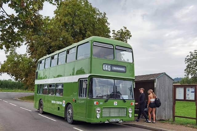 Residents enjoying the free rides on Northamptonshire's vintage buses.