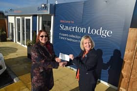 Angela Gee, Daventry Foodbank Manager, with Lynne Muxlow, Bellway Sales Advisor outside Staverton Lodge
