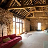 This manor with traditional barn buildings could be yours for a guide price of £1.7 million.