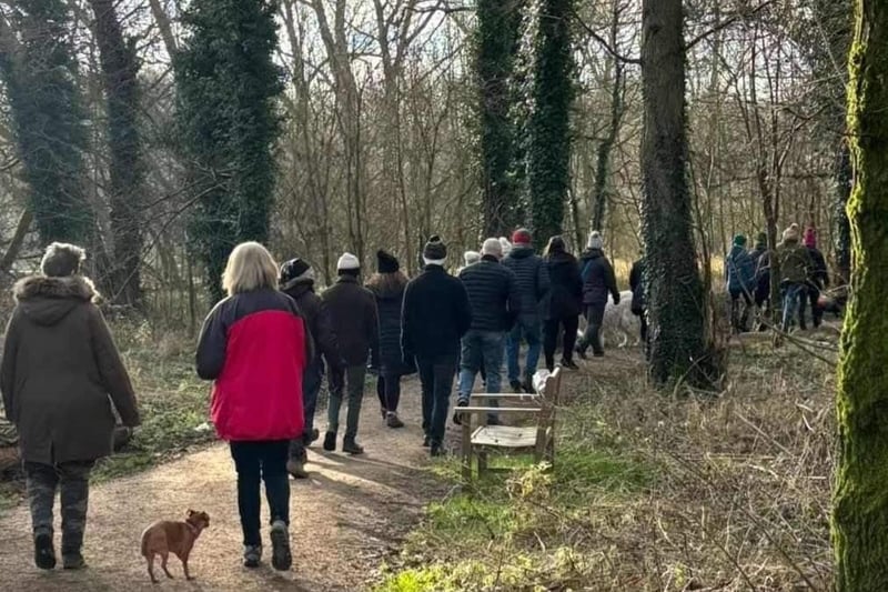 The community group pictured out on a walk.
