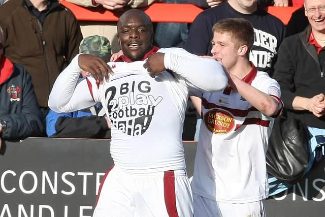 Adebayo Akinfenwa hit back at his critics by wearing a t-shirt that read 'too big 2 play football haha' (photo by Pete Norton/Getty Images)