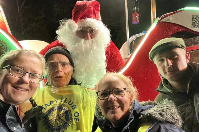 Santa pictured with Sue Hobson, collector and rotarian, Neil Trigwell, collector and rotarian, Leaona Last, a night leader and rotarian, and Albert, the driver.