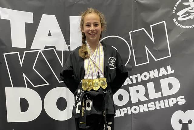 Daniella Kaufman winning gold medals in individual patterns, individual sparring, synchronized patterns, and Tag Team sparring.