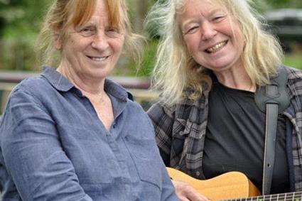 Kate Saffin, writer, producer and performer artistic director of Alarum Productions, pictured with Janul, musician and songwriter.