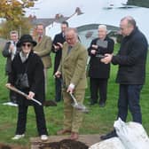 From L to R Maria Summerscale, Lord Lieutenant James Saunders Watson and Daventry MP Chris Heaton-Harris planting the tree.
