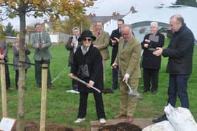 From L to R Maria Summerscale, Lord Lieutenant James Saunders Watson and Daventry MP Chris Heaton-Harris planting the tree.