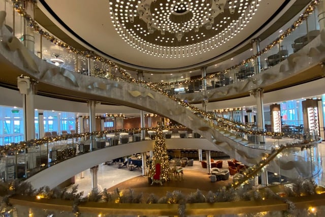 The Grand Atrium on P&O Arvia was pictured by Mary Smith, who joined 250 other passengers sleeping on floors in one of the bar areas.