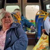 Happy passengers in the new social club on wheels