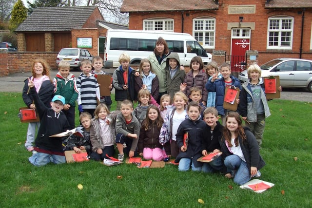 Year 3 children at Greens Norton Primary School with their class teacher and headteacher Jan Pickering pictured at the centre. They spent three days and two nights doing pond-dipping, blindfold orienteering, sketching, and many more activities. It was the first time some of them had been away from home.