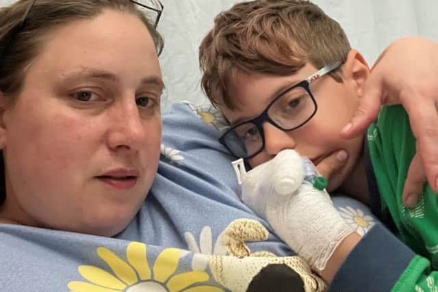 Levi with his mum in hospital during treatment