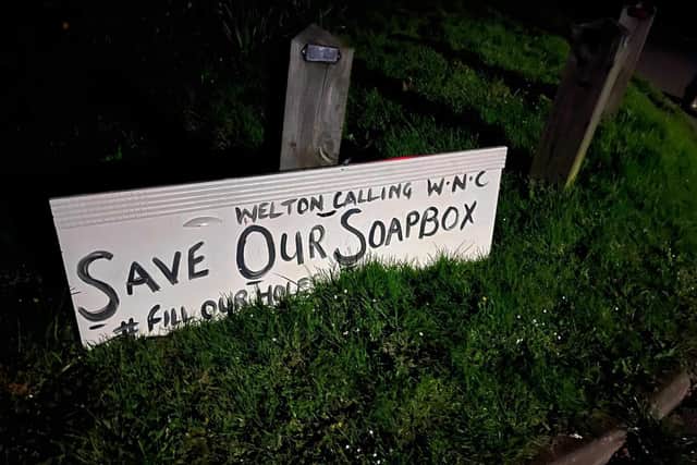 Daventry Banksie displayed 15 hand-painted boards in Welton and Woodford Halse on Friday, April 12, as part of her battle against potholes in the county.