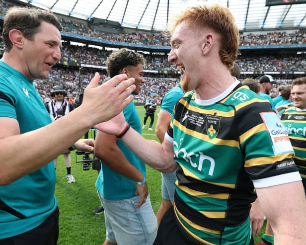 Phil Dowson celebrating with George Hendy after last season's Gallagher PREM final win (photo by David Rogers/Getty Images)