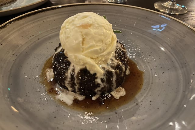 Sticky toffee pudding with stem ginger ice cream.