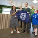 Children from Daventry Hill School visit the printing department at Amazon BHX10 to see their hoodie