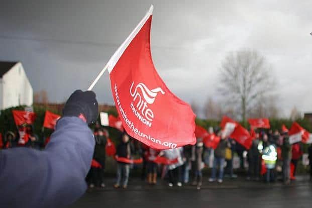Police raided an address in Northamptonshire in connection with investigations into a Unite employee