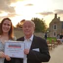 Sophie Good, museum officer, and Roderick Viveash, volunteer museum curator, with the Highly Commended Award for its ‘Borough Hill and its History’ exhibition at the Northamptonshire Heritage Forum Awards.