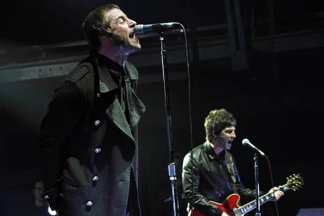 The real Oasis on stage. Picture: Getty Images.