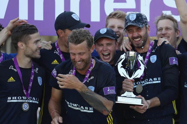 Lewis McManus (left) celebrates Hampshire's One Day Cup triumph at Lord's in 2018