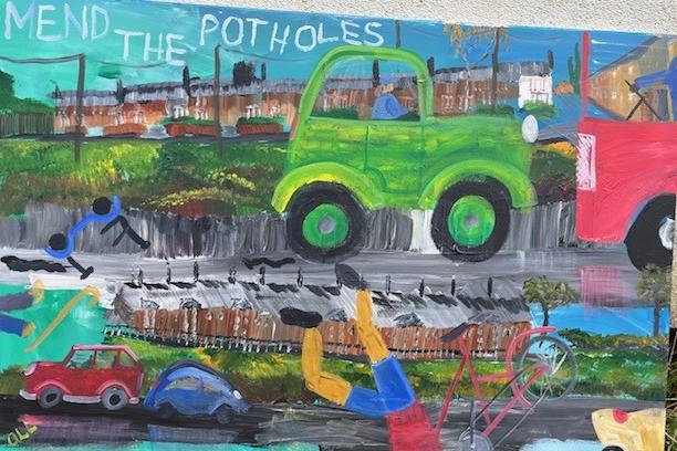 The 'Mend the potholes' painting made as part of a campaign to fix the potholes on The Banks.