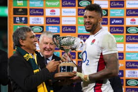 Courtney Lawes of England receives the trophy after the series win over Australia