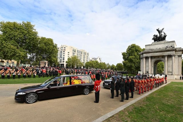 The Royal Hearse carrying the coffin of Queen Elizabeth II at Wellington Arch before heading for the late monarch's final resting place at Windsor